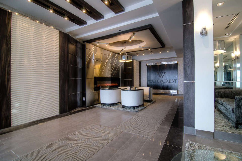 A custom architectural millwork, showcase lobby panelling, steel cladding and woodwork, a project in Barrie Ontario.